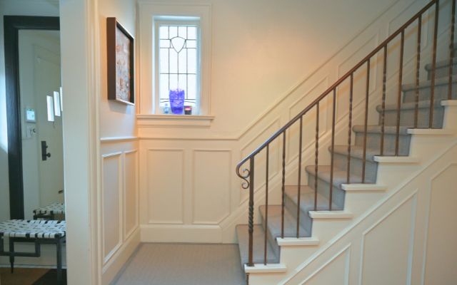 The welcoming front hall sets the tone for the residence.
